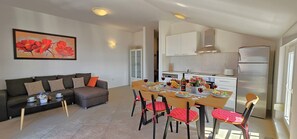 Open plan dining/kitchen and living area