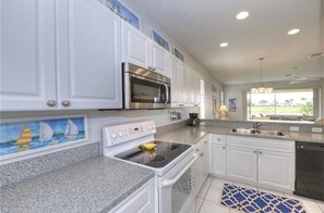 Kitchen is very well stocked and, with opens at both end, works very well.