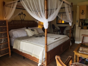 Newly purchased "Tommy Bahama" King size four poster bed.