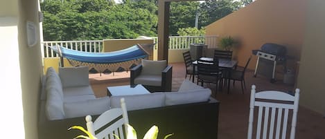 3rd Floor open air terrace with beautiful lounge area, view, hammock and BBQ.