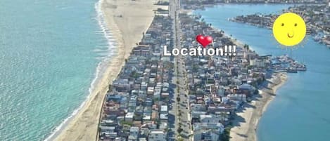 Location! Location! Location !! 3 houses from the bay..1/2 block from the ocean!