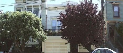 Street view; flat is located through the courtyard.  