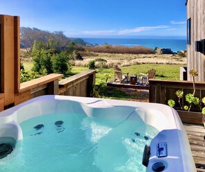 Hidden hot tub with ocean views