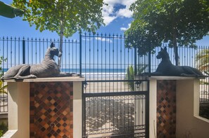 Beach gate with outdoor showers.