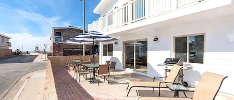 This downstairs vacation home is the perfect spot to enjoy the best of Newport! One house from the sand with plenty of indoor and outdoor space to unwind after a day at the beach!