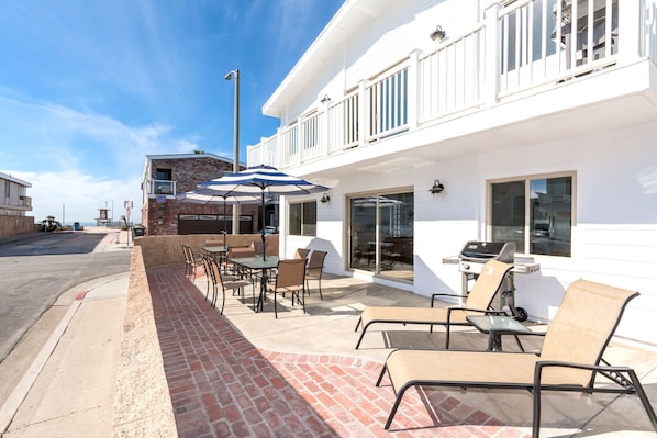 This downstairs vacation home is the perfect spot to enjoy the best of Newport! One house from the sand with plenty of indoor and outdoor space to unwind after a day at the beach!