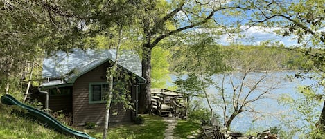 Copake Lakehouse (lakefront). 3 bedrooms, sleeps 8. 14 ft slide, firepit, + more