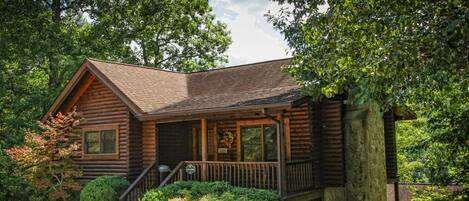 The cabin is nestled back in a quiet setting, but only 1.5 mile from the parkway