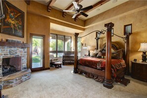 Master Bedroom with crib and fireplace.