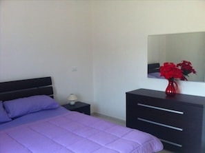 One bedroom, lots of storage, large double bed,  
plenty of room to add a cot.