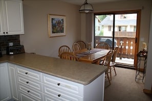 View from kitchen to dining area 