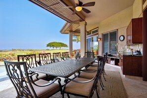 The main outdoor dining table seats 8 to 10 people comfortably