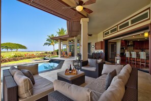 Notice the proximity to the golf course and the spacious lanai and pool area