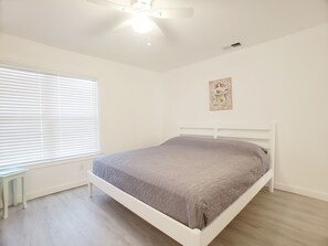 Master Bedroom  has en suite bath and king size bed.