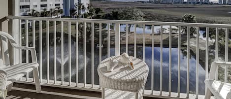 Balcony view of ocean and marsh
