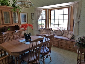 Formal dining room with loveseat.
