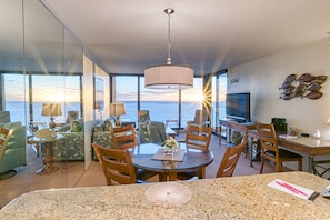Kitchen looking to dining room table and out to ocean!  Cooking dinner view!