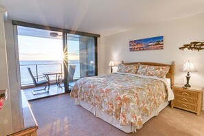 Master bedroom with a new king mattress, private entrance to lanai and bathroom