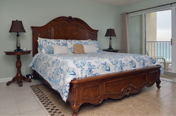 Rich Caribbean-Themed Master Suite.  Luxurious master bed with new bedding!