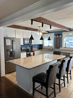 Newly renovated kitchen with granite island, 2 ovens, RO water, 2 refrigerators