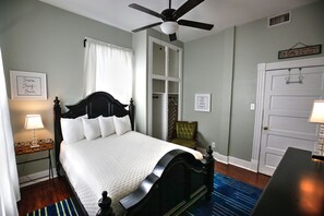 Queen bedroom with soft wool rug and new bed.