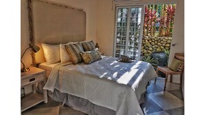A stunning large queen bedroom with matching decor.