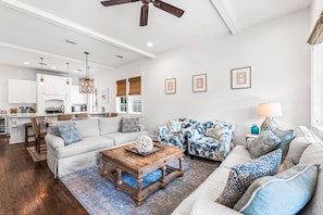 Don't miss out on family time while preparing dinner in this spacious, open floor plan
