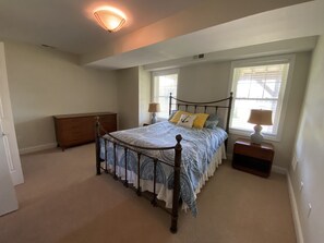 First floor bedroom with queen bed with Pottery Barn bedding