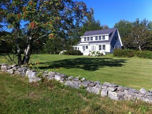 Charming Newbury Neck cottage set on many private wooded and oceanfront acres