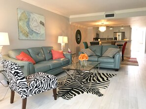 Living room looking toward dining area and kitchen