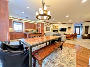 The condos feature open floor plans to accommodate your group. this condo has a large breakfast bar for 4, dining table for 8, adjoining nook for 2.
