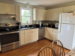 Fully stocked eat in Kitchen - recently replaced stove and dishwasher 2022
