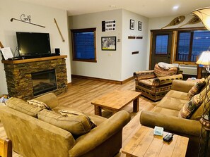 Living Room with TV and Electric Fireplace