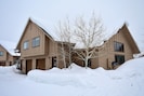 Exterior of condo in winter, easy ski-in/ski-out from Bear Back Poma Lift.