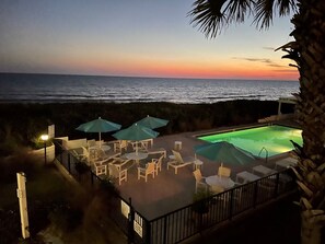 Panoramic view of gulf and pool at sunset