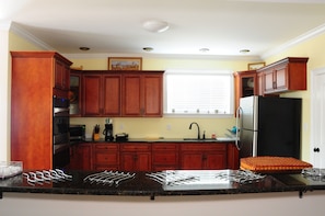 Large kitchen with stainless steel appliances