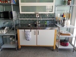 Kitchen w/storage. Everything you need to cook and serve a great meal. 