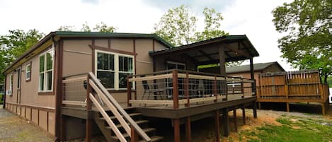 new rear covered deck looking at lake 