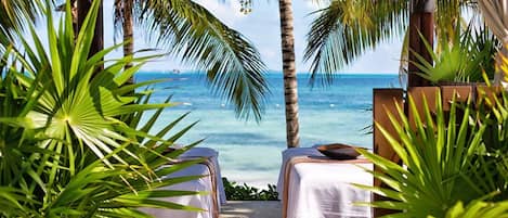 beachfront massage available from the full-service spa