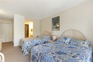 Second bedroom has 2 double beds, bathroom w/shower, TV, private lanai.