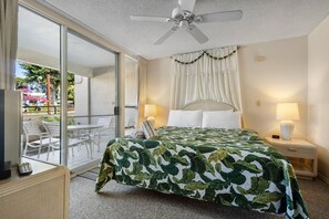 Master bedroom features a comfortable king bed.