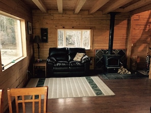 downstairs sitting area and wood stove