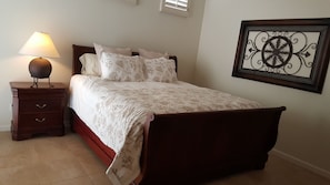 Tranquil master bedroom, with TV