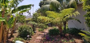 Private tropical patio with seating for 4