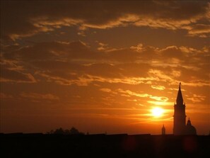 A glimpse of San Giorgio over the rooftops, taken from the bedroom at sunset