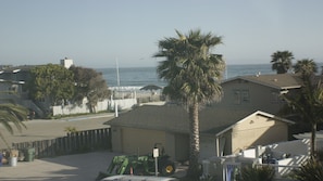 View from our deck off living room (Beach across the street )
