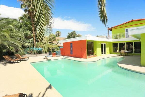 Back yard pool. Outside bathroom , sliders to master bedroom.   