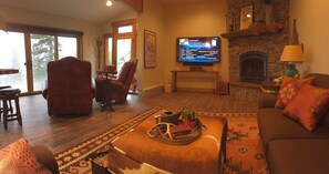 Put a movie on the cable-connected 65" flatscreen with full surround sound. 