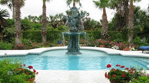 Beautiful Pool with Antique Fountain in Tropical Garden