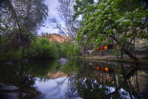 As the sun sets, a peaceful, relaxing private riverfront setting!